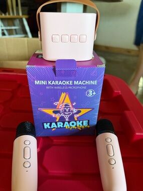 Portable Pink Mini Karaoke Machine with Two Wireless Mics